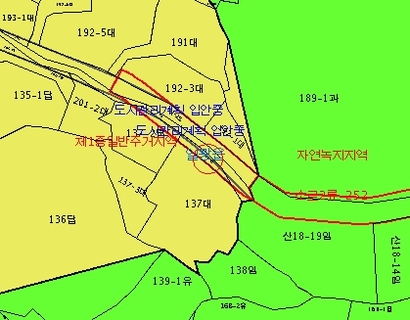 부산 기장군이 입안 중인 지구단위계획 신설 도로(빨간선)에 포함된 박형준 부산시장 후보자 땅(빨간 동그라미). 사진=국토교통부 토지이음