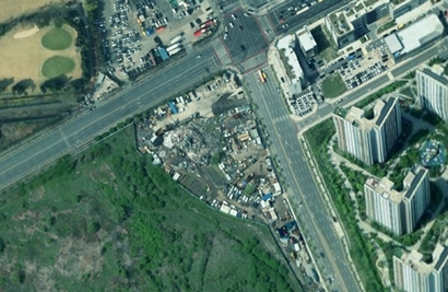 한국자산관리공사(캠코)가 인천 연수구를 상대로 토지정밀조사 명령을 취소해달라는 소송을 제기해 최근 승소한 것으로 확인됐다. 문제가 된 인천 연수구 옛 송도유원지 인접 부지 위성 사진. 사진=캠코 제공