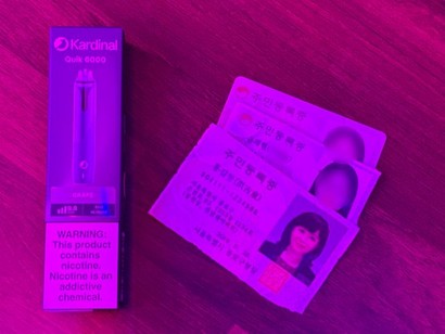 무인 전자담배 매장에서 ‘홍길동’ 주민등록증 이미지를 인쇄해 신분증으로 스캔하자 곧바로 결제가 됐다. 사진=윤채현 인턴 기자