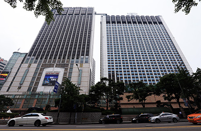 롯데그룹의 부담 사업군으로 꼽혀온 면세와 건설 부문에서 동시에 개선 신호가 나왔다. 사진=연합뉴스