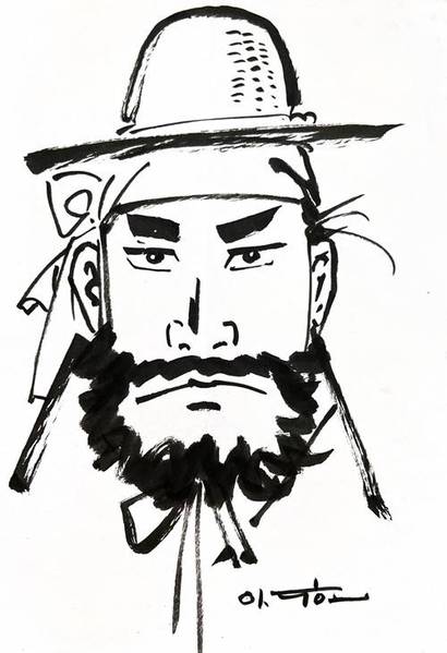 슥슥, 이두호 작가가 즉석에서 그려준 임꺽정. 그림에 힘이 넘친다. 사진=필자 제공